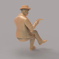 MM2081 Man reading paper Figure